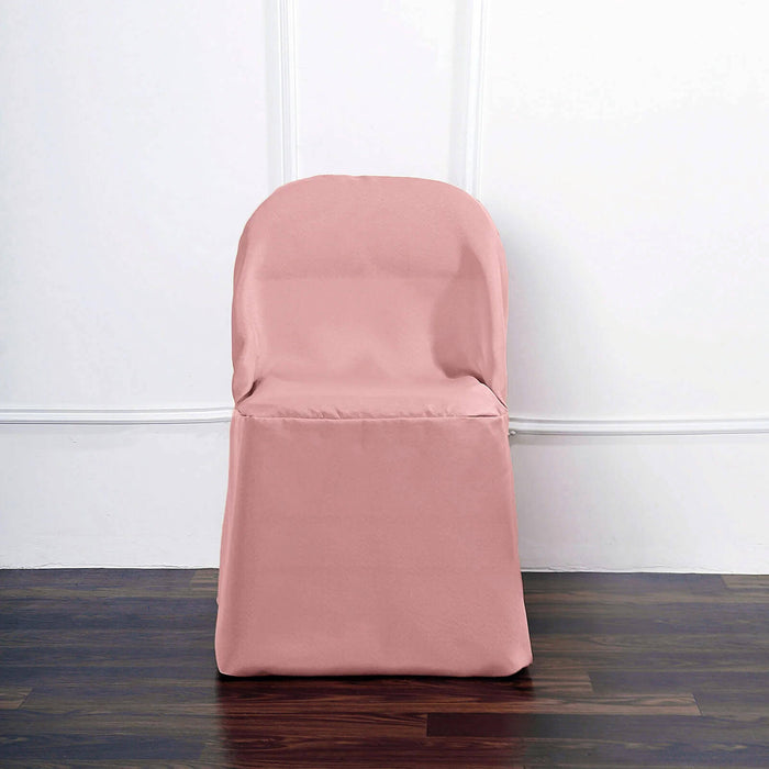 Pink chair cover on a wooden floor against a plain wall.