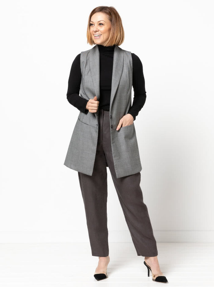 Andrea Woven Vest sewing pattern, featuring a long line vest with a shawl collar, sleeveless design, and optional pockets for a sleek and stylish garment.