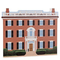 A wooden block featuring a two-story house with a front porch and columns, designed in the Federal style, with colorful details on the front.