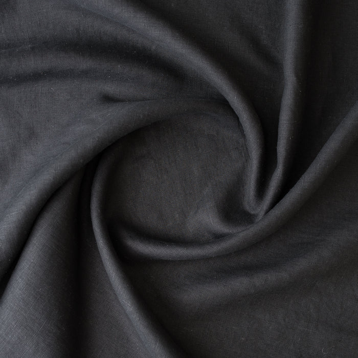 Close-up of Black extra wide 280cm 100% linen fabric 165gsm for dresses, shirts, skirts, relaxed pants, curtains and home textiles
