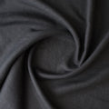 Close-up of Black extra wide 280cm 100% linen fabric 165gsm for dresses, shirts, skirts, relaxed pants, curtains and home textiles