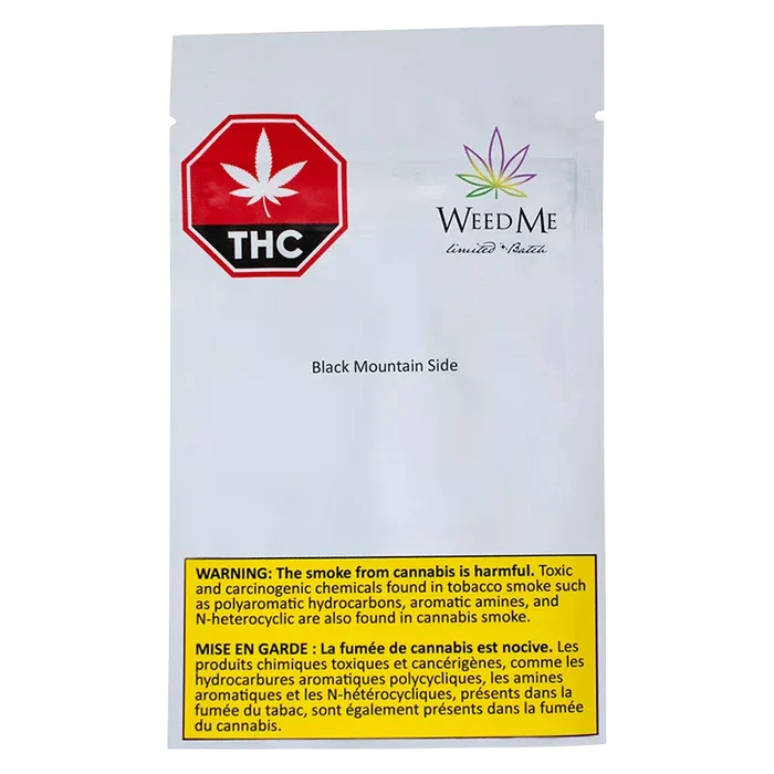 Front-facing image of the WeedMe Black Mountain Side pouch on a white background showing a red THC stop sign logo, the WeedMe leaf logo, and a yellow warning box at the bottom.