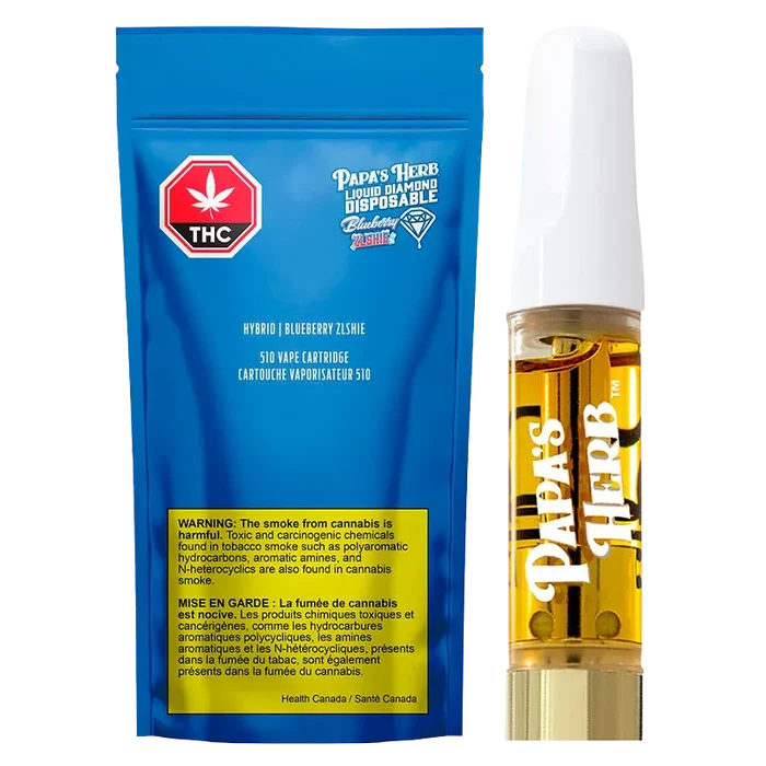 Front-facing product shot of the Blueberry Zlshie Vape Cartridge showing a blue resealable pouch beside a clear cartridge filled with golden oil.