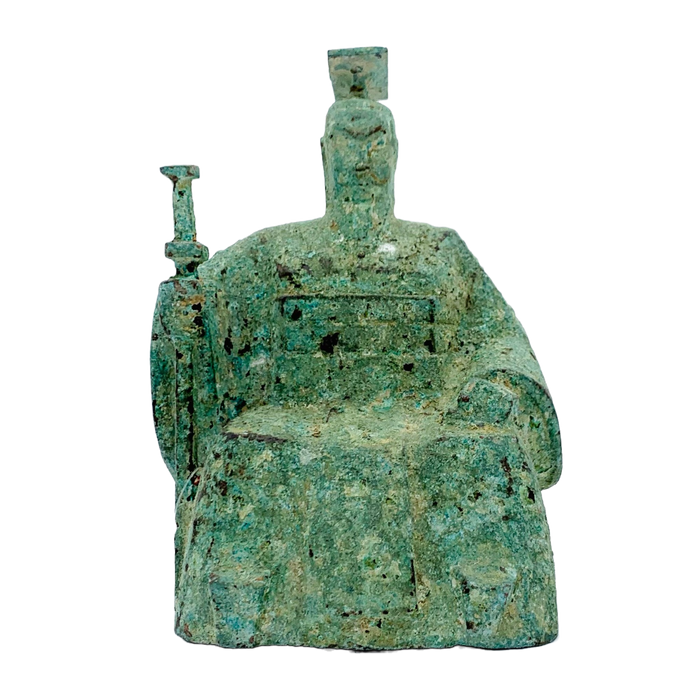 A bronze sculpture of a Qing Dynasty Emperor wearing a green and brown robe, seated on a throne with a textured patina to simulate antiquity.