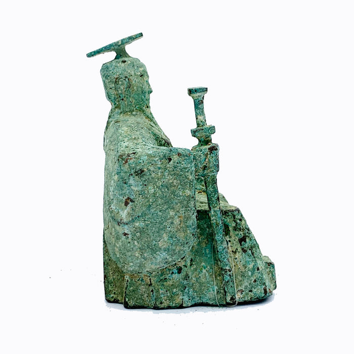 A bronze sculpture of a Qing Dynasty Emperor wearing a green and brown robe, seated on a throne with a textured patina to simulate antiquity.