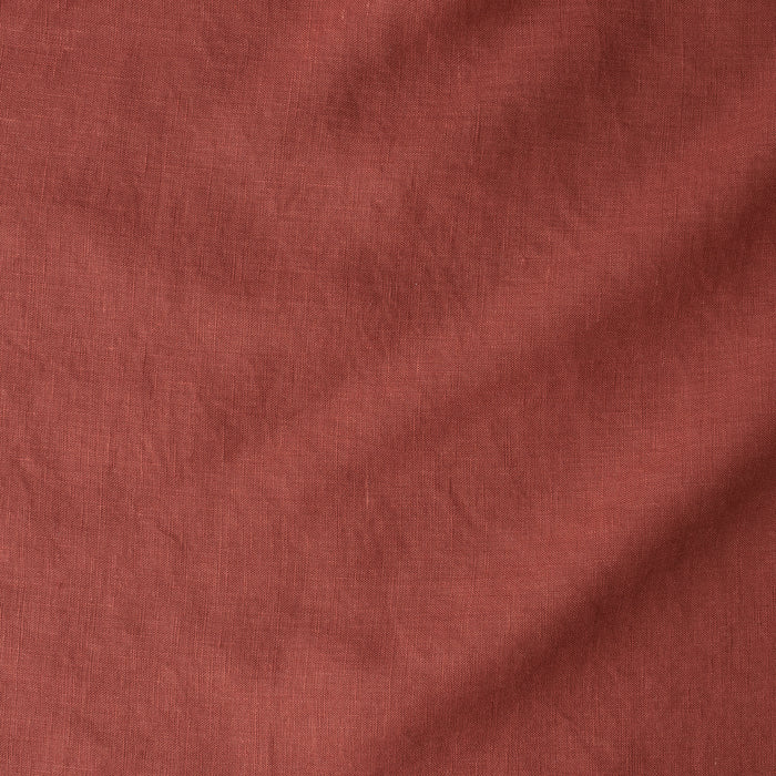 Close-up of a textured rust-colored fabric
