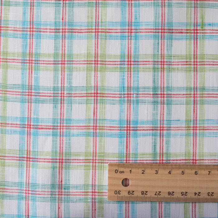 Colorful Carnival Check Linen Fabric featuring a mix of aqua, green, and red threads on white, suitable for a variety of light and airy garments.