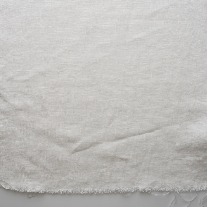 Close-up ofChalk White extra wide 280cm 100% linen fabric 300gsm for jackets, aprons, cushions, curtains and structured home textiles on a plain background