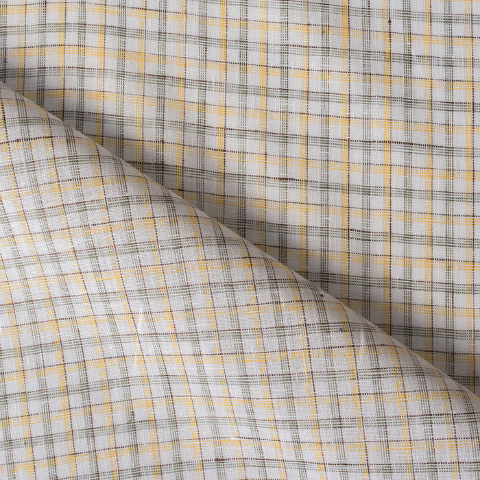 Country Lane Plaid Linen Fabric featuring moss green, light yellow, and brown threads on a cream background, ideal for creating small-scale, fine plaid garments.