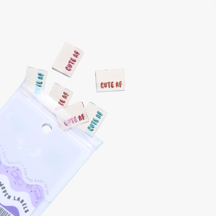 Cute AF woven KATM sewing labels for handmade clothes and DIY sewing projects