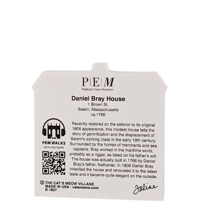 Decorative wood block of the Daniel Bray House with informative text on the reverse.