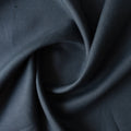 Close-up of dark  navy blue linen fabric with folds