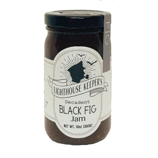 A glass jar with a black lid. The label reads 'Lighthouse Keepers Decadent Black Fig Jam'