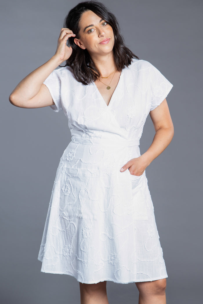 Charming Elodie Wrap Dress pattern with release pleats, dolman sleeves, and a choice of skirt lengths, perfect for any occasion from picnics to weddings