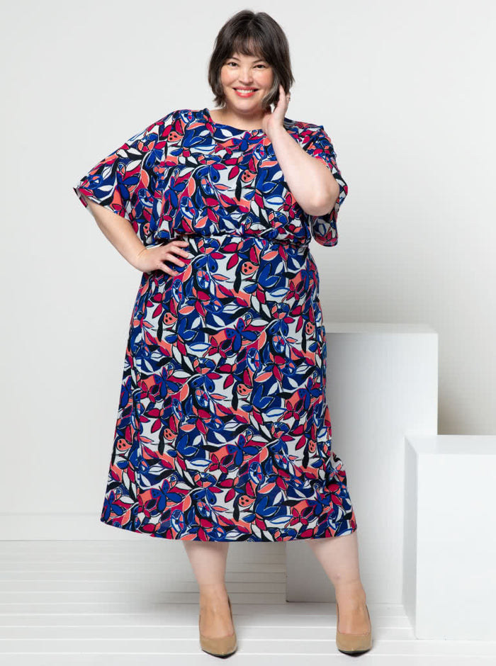 Elsbeth Woven Dress sewing pattern featuring gathered front bodice, optional sleeves, and a fitted panelled skirt, suitable for cotton, linen, viscose, and silk fabrics