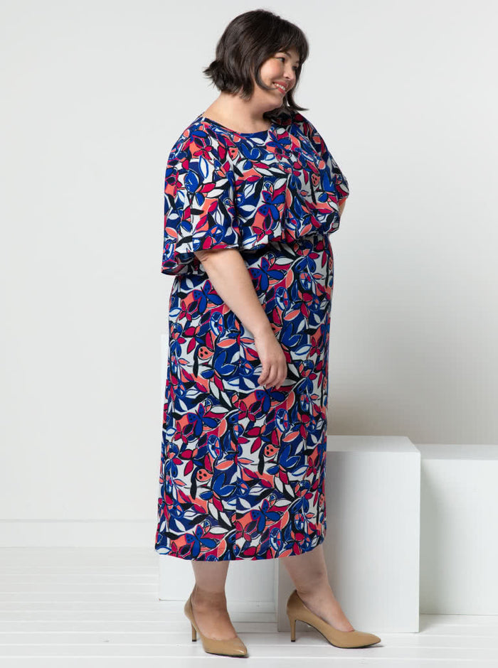 Elsbeth Woven Dress sewing pattern featuring gathered front bodice, optional sleeves, and a fitted panelled skirt, suitable for cotton, linen, viscose, and silk fabrics