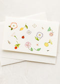 A greeting card with garden botanical illustrations.