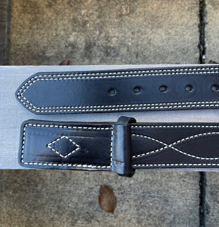 Buckle end and hole-punched end shown.
