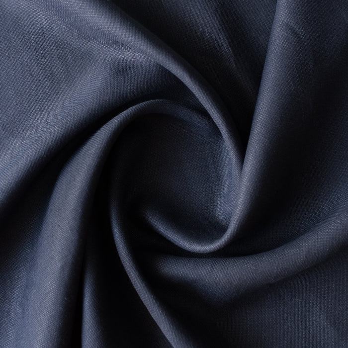 Ink navy linen fabric with visible yarn texture, slightly loose weave, suiting weight
