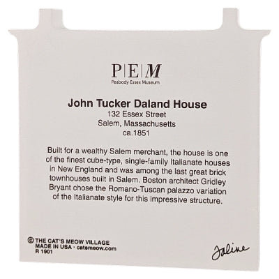 Decorative wood block of the John Tucker Daland House with informative text on the reverse.