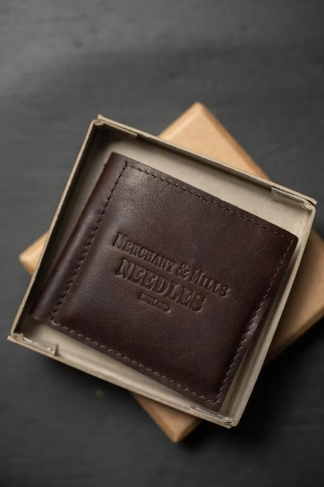 Merchant & Mills Leather Needle Wallet with premium needles and baby bow scissors for mending on the go