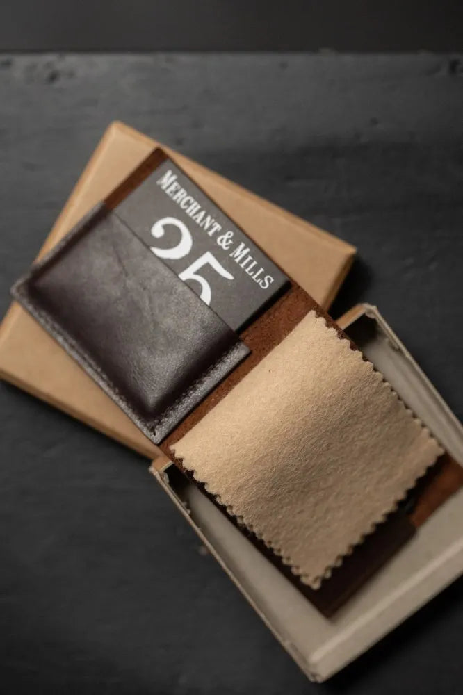 Merchant & Mills Leather Needle Wallet with premium needles and baby bow scissors for mending on the go