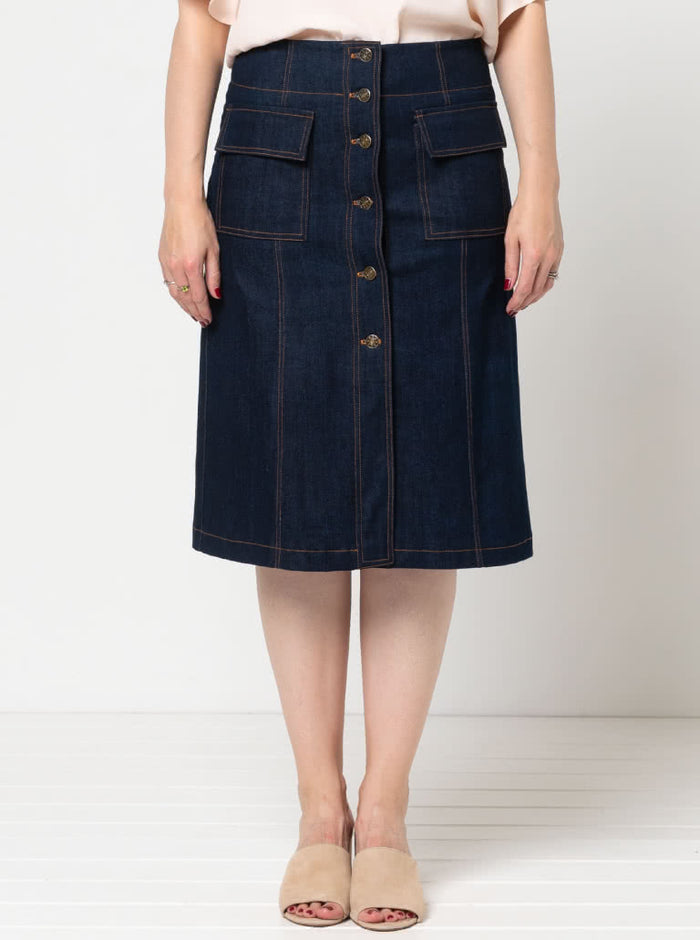 Lennox Woven Skirt made using the sewing pattern, "A" line panelled design, button-through front, patch pockets with flaps, shown in linen fabric.