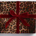 Leopard paper with red velvet ribbon