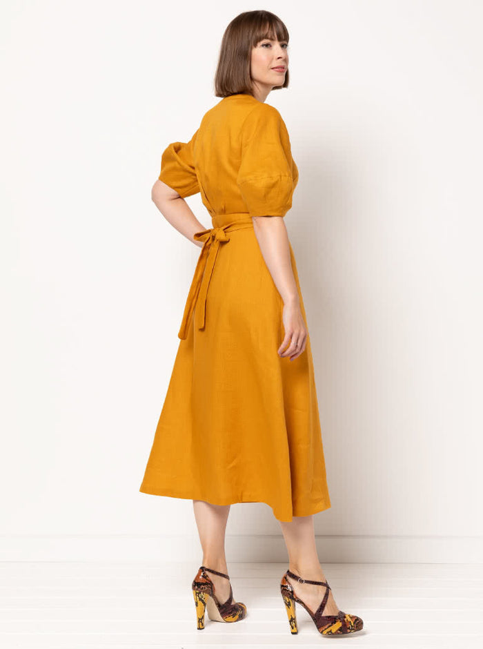 graceful Millicent wrap dress sewing pattern with a long wrap skirt and versatile sleeve options, perfect for creating a sophisticated garment in fine fabrics.
