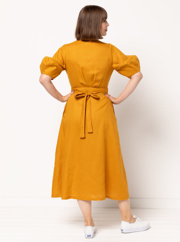 graceful Millicent wrap dress sewing pattern with a long wrap skirt and versatile sleeve options, perfect for creating a sophisticated garment in fine fabrics.