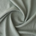 Close-up ofMisty Sage extra wide 280cm 100% linen fabric 300gsm for jackets, aprons, cushions, curtains and structured home textiles with folds
