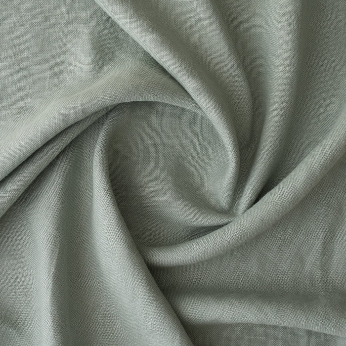 Close-up ofMisty Sage extra wide 280cm 100% linen fabric 300gsm for jackets, aprons, cushions, curtains and structured home textiles with folds