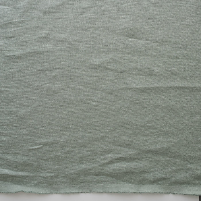Close-up of Misty Sage extra wide 280cm 100% linen fabric 300gsm for jackets, aprons, cushions, curtains and structured home textiles fabric
