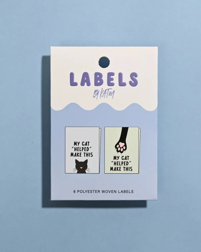 Pack of labels with humorous designs on a blue background