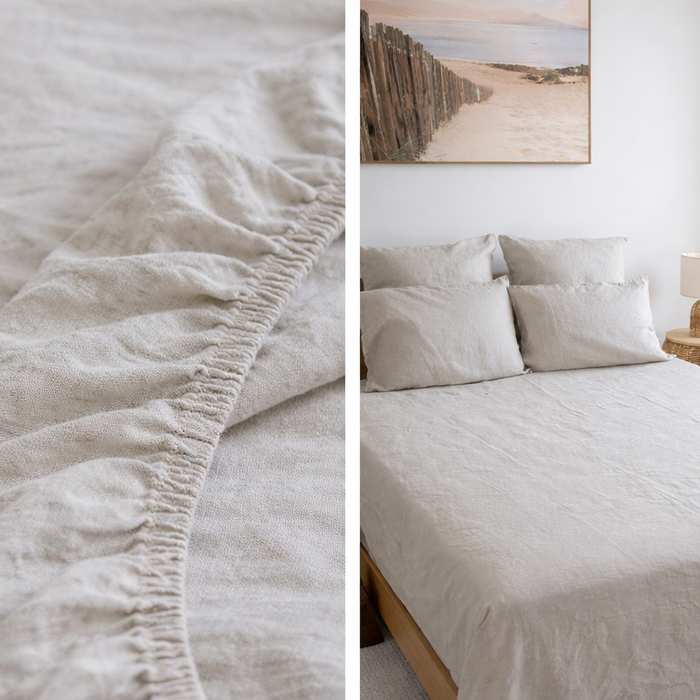 Close-up of textured Natural linen fitted sheet soft beige bedding in a neatly made bed with light-colored bedding.