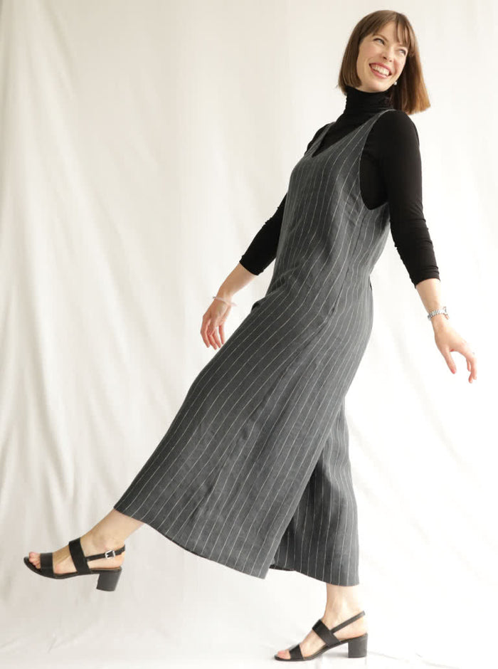 A comfortable Norman V-neck jumpsuit sewing pattern with deep armholes and wide legs, perfect for creating a chic and easy-to-wear garment.
