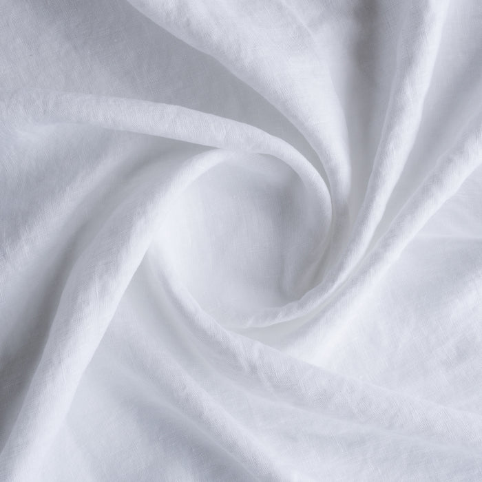 pure white extra wide linen fabric in close up