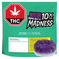 Front-facing shot of the green bag packaging labeled Ratio'd Moon Berry THC:CBD:CBN Gummies with a red THC stop-sign icon and a sugared purple gummy in the corner