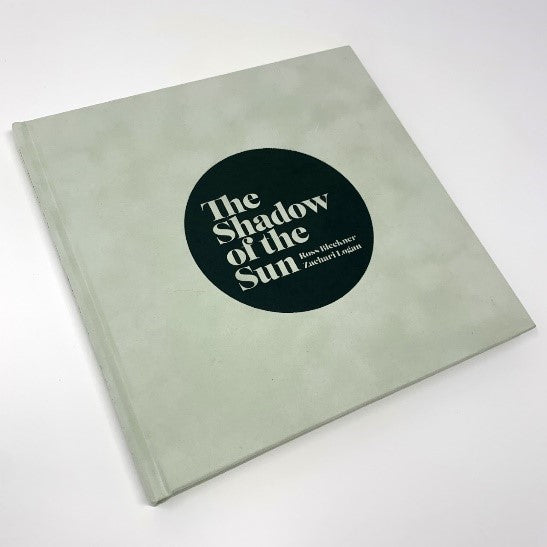 A book cover for 'The Shadow of the Sun: Ross Bleckner & Zachari Logan' with a minimalist design featuring the title and the names of the artists in white text on a muted green background.