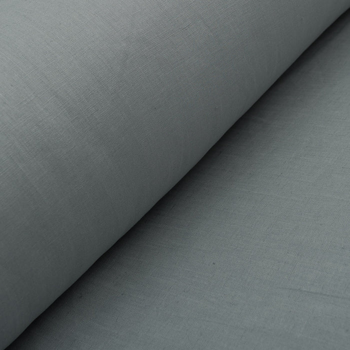 Refined Slate linen fabric with a smooth finish and soft drape, suitable for a variety of elegant dressmaking applications.