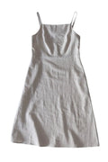 Light gray slip dress on a white background