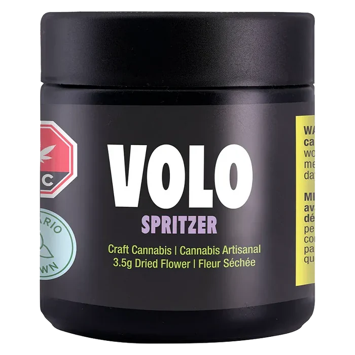 Front-facing shot of the black jar labeled VOLO Spritzer with bold white VOLO text and purple "Spritzer" above yellow product details.