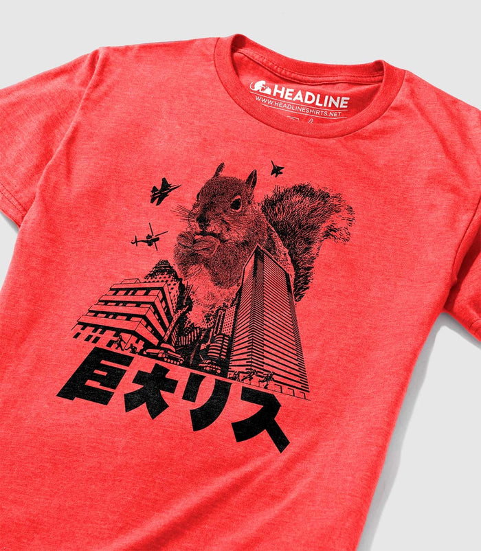 A red t-shirt with a black graphic print of a squirrel and the text 'Giant Squirrel' or 'Squirrel Monster' in Japanese.