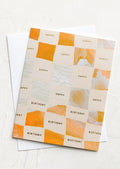 A birthday card with checker print.
