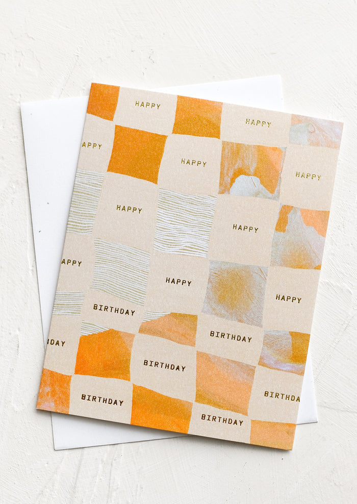 A birthday card with checker print.