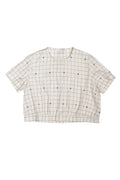 Grid-patterned top made using The Celeste Sewing Pattern by Merchant & Mills – feminine blouse with back buttons and gathered waist
on a white background