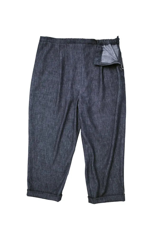 The Eve Trouser Sewing Pattern by Merchant & Mills – cropped tapered trousers with side zip and pleats on a white background
