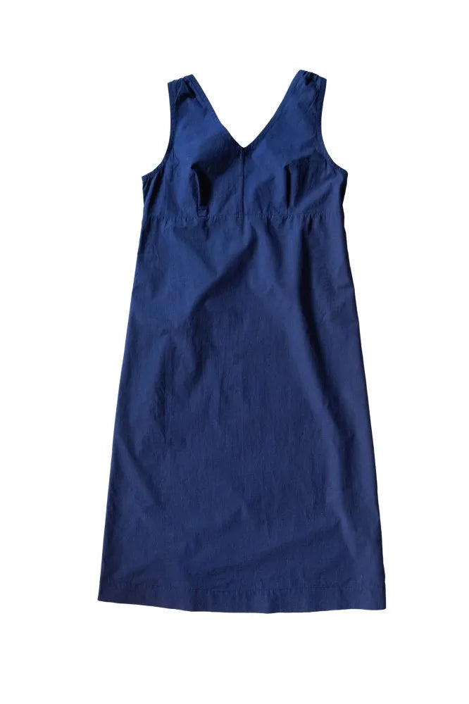 Blue dress made using The Lilian Sewing Pattern by Merchant & Mills on a white background