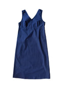 Blue dress made using The Lilian Sewing Pattern by Merchant & Mills on a white background