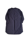 Navy blue dress made using The Niven Sewing Pattern by Merchant & Mills with long sleeves on a white background